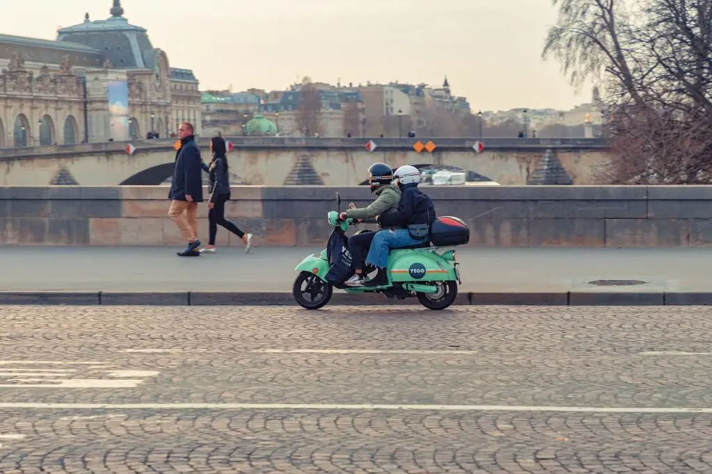 How to add external battery to scooter?