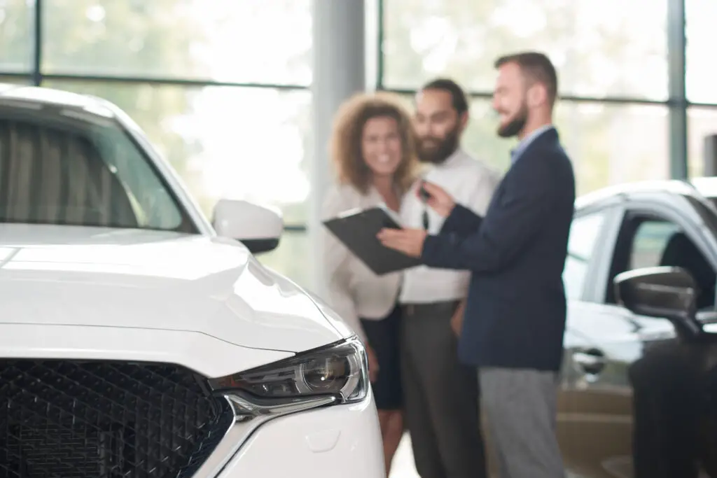 How do car dealerships make money?