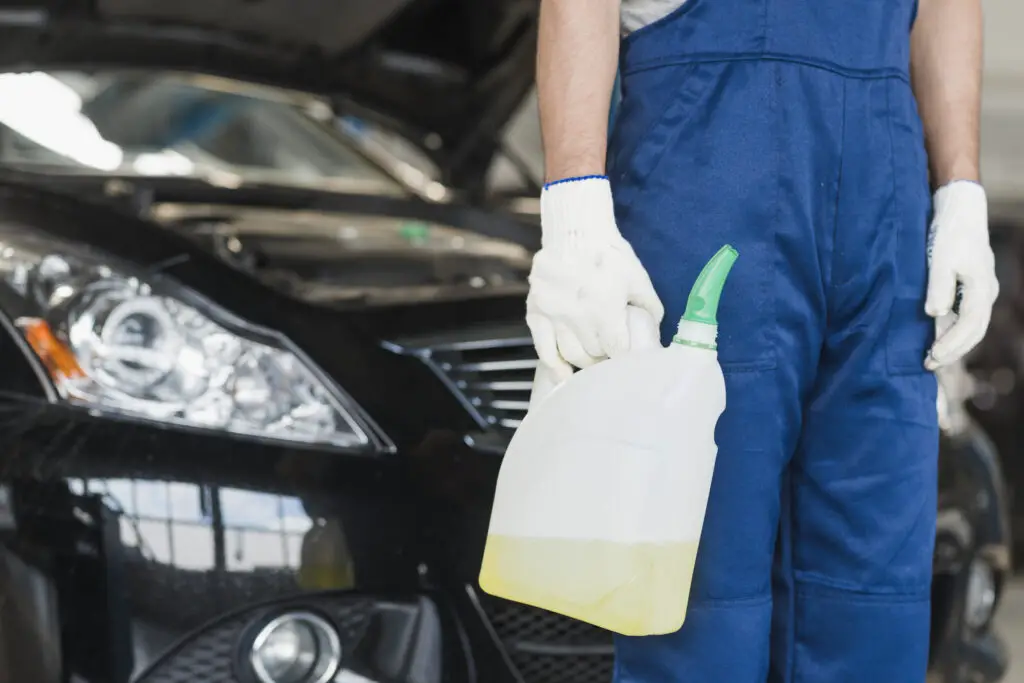 Where do you put coolant in a car?