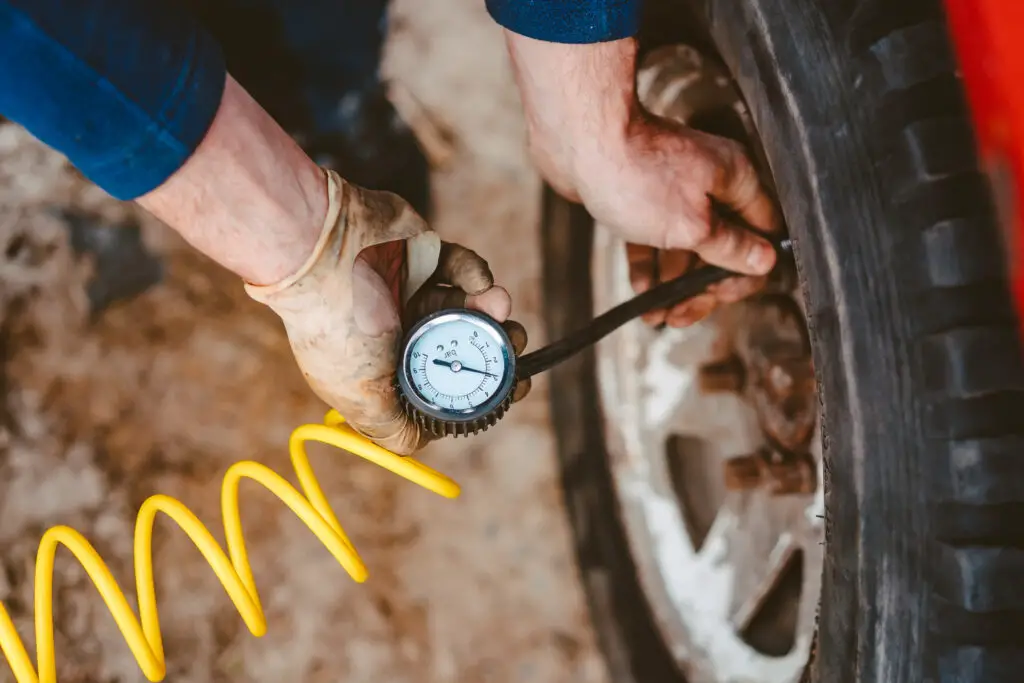 How to check tire pressure at gas station?